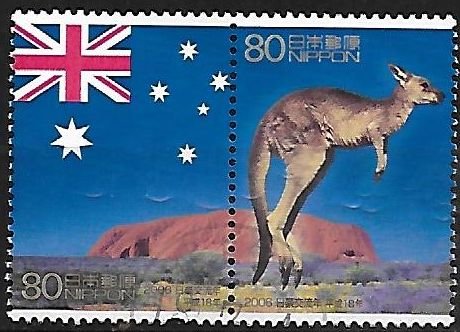 Colnect-5405-319-National-Flag-of-Australia-Ayers-Rock-and-Kangaroo.jpg