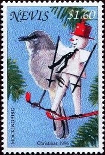 Colnect-3544-804-Mockingbird-with-snowman-decoration.jpg