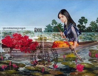 Colnect-3988-424-Red-Flowers-in-Canoe.jpg