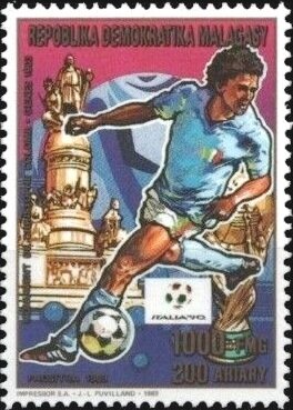 Colnect-5476-204-Player-and-Columbus-Monument-Genoa.jpg