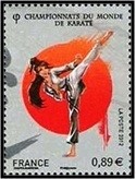 Colnect-1448-199-Combattante-r-eacute-alisant-un-Mawashi-Geri.jpg