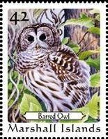 Colnect-5814-024-Barred-Owl%C2%A0Strix-varia.jpg