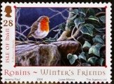 Colnect-3740-480-European-Robin-Erithacus-rubecula-Foot-Of-Tree.jpg