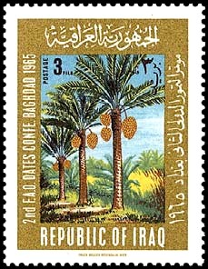 Colnect-1884-026-Landscape-scene-with-date-palms.jpg