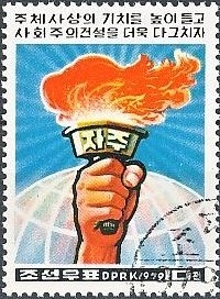 Colnect-2792-634-Hand-with-torch.jpg