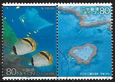 Colnect-5405-321-Lined-Butterflyfish-Chaetodon-lineolatus--amp--Heart-Reef.jpg