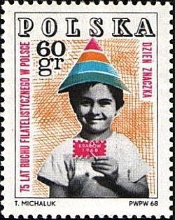 Colnect-4628-125-Child-holding-symbolic-stamp.jpg