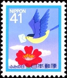 Colnect-2176-393-Bird-delivering-letter-to-flower.jpg