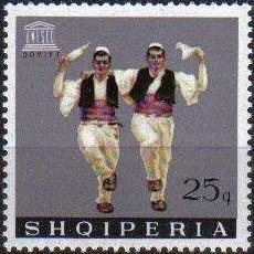 Colnect-1408-291-UNESCO-Emblem-and-male-folk-dancers.jpg