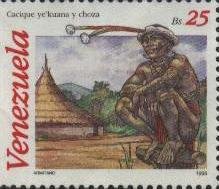 Colnect-536-435-Ye-kuana-man-seated-on-post.jpg