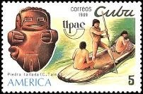 Colnect-1621-768-Stone-carving-Indians-in-dugout-canoe.jpg