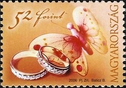 Colnect-529-284-Rings-and-butterfly.jpg