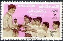 Colnect-1954-933-President-Kassem-with-children.jpg