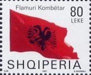 Colnect-1533-625-Albanian-flag-blowing-in-wind.jpg