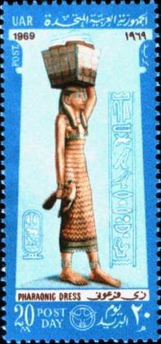 Colnect-1311-981-Post-Day---Pharaonic-Dress-Girl-carrying-basket.jpg