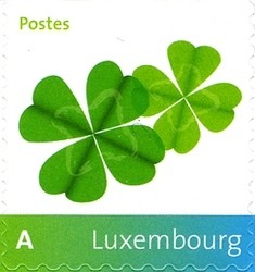 Colnect-858-479-Four-leaf-clovers.jpg