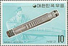 Colnect-2724-179-Komunko-six-stringed-zither.jpg