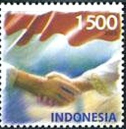 Colnect-2487-531-Greetings-Stamps--Handshake-and-national-flag.jpg