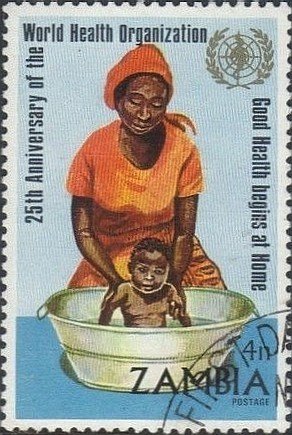 Colnect-2913-301-Mother-Washing-Baby.jpg