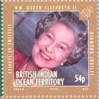 Colnect-1963-086-Queen-Elizabeth-II-wearing-red-dress-colour-photograph.jpg