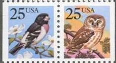 Colnect-199-447-Owl-and-Grosbeak.jpg