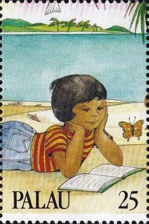 Colnect-5494-913-Boy-reading.jpg