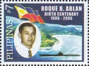 Colnect-2527-551-Roque-R-Ablanflag-and-submarine.jpg