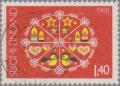 Colnect-2910-583-Snow-crystal-with-Christmas-symbols.jpg