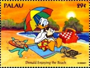 Colnect-3511-151-Donald-enjoying-beach.jpg