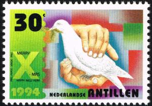 Colnect-2205-735-Hands-holding-dove.jpg