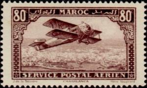 Colnect-704-604-Biplane-over-Casablanca.jpg