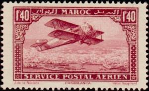 Colnect-704-606-Biplane-over-Casablanca.jpg