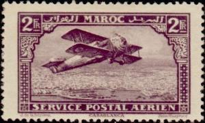 Colnect-704-608-Biplane-over-Casablanca.jpg