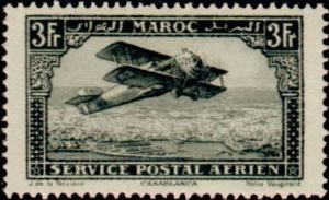 Colnect-704-610-Biplane-over-Casablanca.jpg