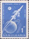 Colnect-3059-842-Two-stage-imagination-rocket-orbiting-earth-moon.jpg