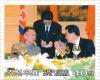 Colnect-3246-053-Kim-Jong-Il-at-the-table-with-Hu-Jintao.jpg