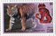 Colnect-4397-171-Tiger-Panthera-tigris-and-carving-of-tiger.jpg