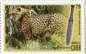 Colnect-4397-173-Cheetah-Acinonyx-jubatus-and-decorated-Egyptian-knife.jpg