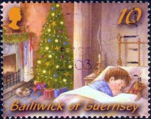 Colnect-1406-659-Sleeping-Boy--amp--Christmas-Tree.jpg