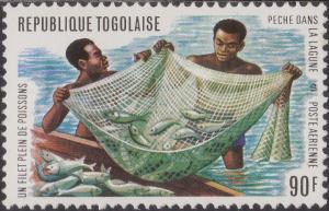 Colnect-1458-633-Fishermen-bringing-in-net-with-catch.jpg