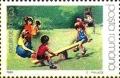 Colnect-3570-115-Children-Playing.jpg