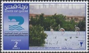 Colnect-5539-671-Ras-Laffan-Industrial-City-emblem-flamingos-near-industrial.jpg