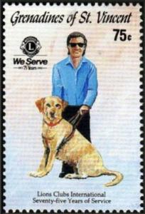 Colnect-3433-483-Blind-man-with-guide-dog.jpg