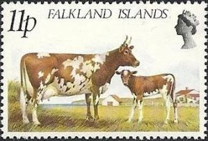 Colnect-1723-917-Frisian-Cow-and-Calf-Bos%C2%A0primigenius-taurus.jpg