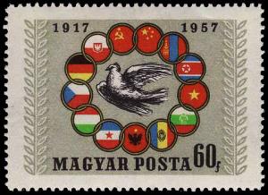 Colnect-998-294-Peace-dove-surround-by-flags-of-socialist-countries.jpg