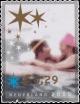 Colnect-773-424-Man-And-Woman-In-Ice-Water.jpg