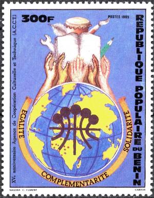 Colnect-5288-597-Emblem-globe-hands-book.jpg