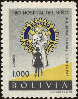 Colnect-5491-705-Rotary-Emblem-and-nurse-with-children.jpg