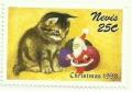 Colnect-3862-093-Kitten-with-Santa-Claus.jpg