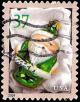 Colnect-5270-250-Green-Santa--Ornaments.jpg